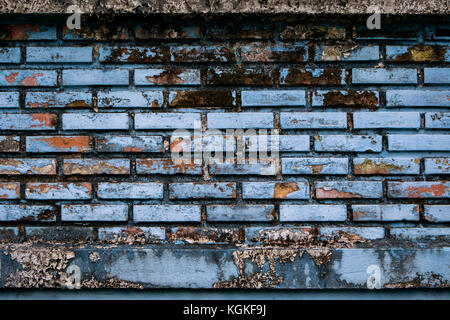 old blue grungy brick wall use as background Stock Photo
