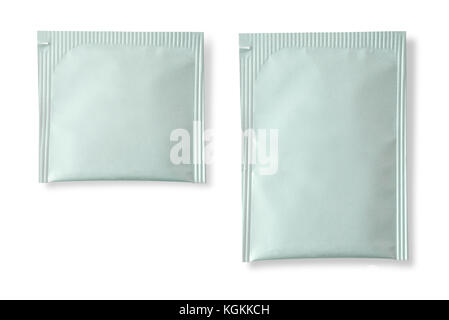 Blank white plastic sachet for medicine, drugs, coffee, sugar, salt, spices, isolated on white background . Stock Photo