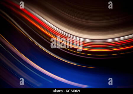 Full frame abstract image of colorful light trails against black background Stock Photo
