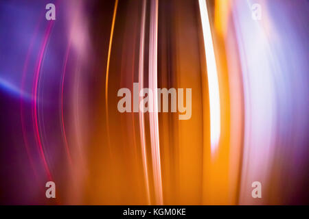 Full frame abstract image of orange light trails Stock Photo