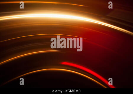 Abstract image of vibrant light trails against black background Stock Photo