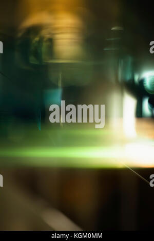 Abstract light trails against black background Stock Photo