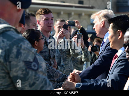 President Donald J. Trump speaks with Airmen from at Osan Air Base, Republic of Korea, Nov. 8, 2017. During his 13-day trip through the Pacific Theate Stock Photo