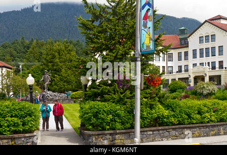 Park in Sitka, Alaska with the Alaska Pioneers Home and a prospector statue. Stock Photo