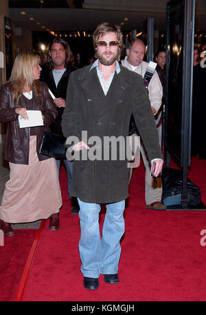 Brad Pitt arriving at the premiere of Panic Room at the Loews Century Theatre in Los Angeles. March 18, 2002.  Brad Pitts 104  = People, Vertical, Full Length, USA, California, City Of Los Angeles, One Person, Photography, Brad Pitt, Arts Culture and Entertainment, Looking at the Camera, Stock Photo