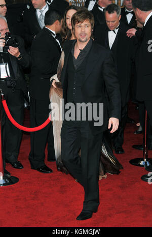 Brad Pitt and Angelina Jolie  arriving at the SAG Awards 2008 at the Shrine Auditorium in Los Angeles.  full length fashionBrad Pitts 105  = People, Vertical, Full Length, USA, California, City Of Los Angeles, One Person, Photography, Brad Pitt, Arts Culture and Entertainment, Looking at the Camera, Stock Photo