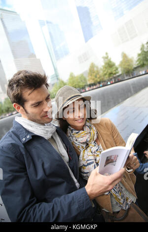 Tourists visiting 911 memorial in Manhattan Stock Photo