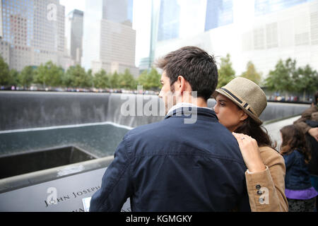 Tourists visiting 911 memorial in Manhattan Stock Photo