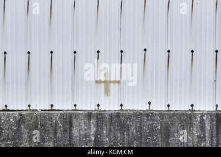 Corrugated iron fence Stock Photo