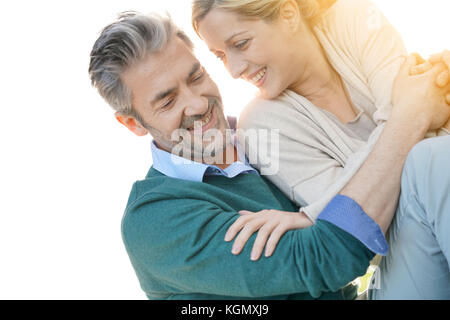 Middle-aged couple embracing each other Stock Photo