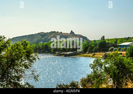 Peninsula with views of the Church of the Holy Apostles on of the аlpine lake Sevan in Armenia Stock Photo