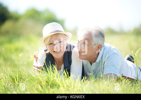 Senior couple relaxing in countryside Stock Photo
