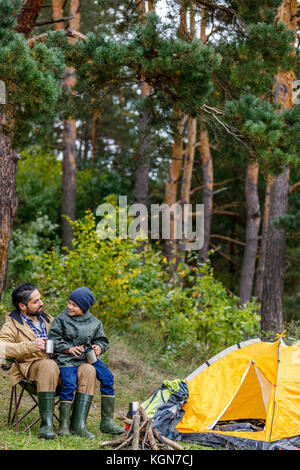 father and son in camping Stock Photo