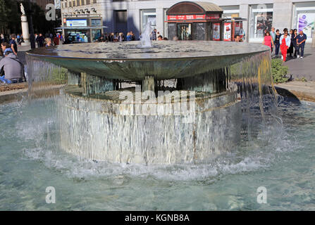 Water fountain in Plaza de la Puerta del Sol, Madrid city centre, Spain Stock Photo