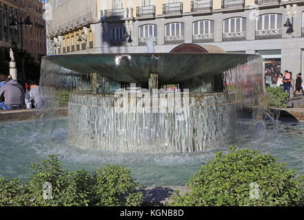 Water fountain in Plaza de la Puerta del Sol, Madrid city centre, Spain Stock Photo