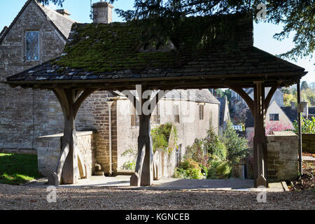 All Saints church lychgate in autumn. Bisley, Cotswolds, Gloucestershire, England Stock Photo