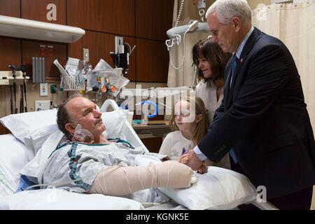Texas, USA. 8th November, 2017. U.S. Vice President Mike Pence and Karen Pence comforts a victim of the Sutherland Springs Baptist Church shooting during a visit to Brooke Army Medical Center November 8, 2017 in San Antonio, Texas. Credit: Planetpix/Alamy Live News Stock Photo
