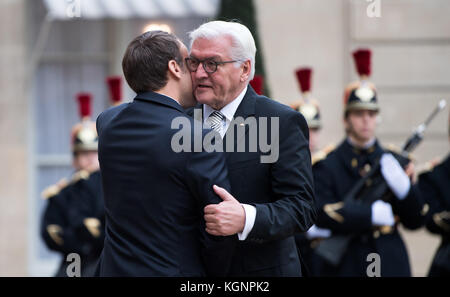 Paris, France. 10th Nov, 2017. French President Emmanuel Macron (L) welcomes German President Frank-Walter Steinmeier with military honours at the Elysee Palace in Paris, France, 10 November 2017. After their meeting Steinmeier and Macron will pay a visit to the Hartmannsweilerkopf memorial site in the Alsace region to commemorate the soldiers of World War I. Credit: Bernd von Jutrczenka/dpa/Alamy Live News Stock Photo