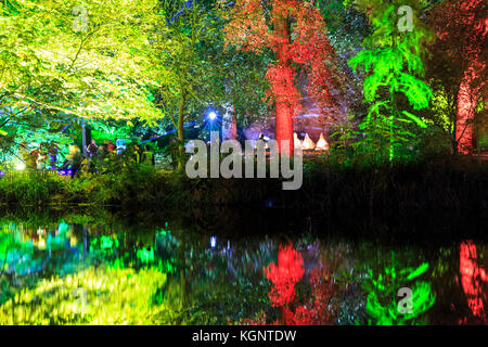 Syon Park, London, UK. 10th Nov, 2017. A trail leads visitors through the illuminated Syon Park with beautifully lit trees, the lake, Syon House and the Orangerie with its spectacular laser show Credit: Imageplotter News and Sports/Alamy Live News Stock Photo