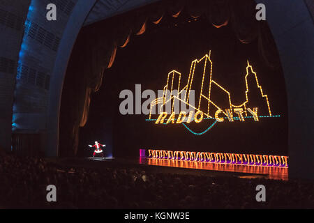New York, USA, 10 Nov 2017.  Santa Claus appears at the start of the 2017 Christmas Spectacular show at New York's Radio City Music Hall starring the Radio City Rockettes.  The traditional holidays show that started in 1933 will run from November 10, 2017  to January 1st, 2018.  Photo by Enrique Shore/Alamy Live News Stock Photo