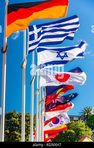 International flags flying at at Tamarama Beach in Sydney, NSW, Australia Stock Photo