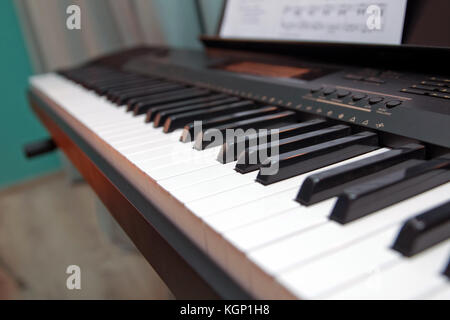 Keys electronic synthesizer close up. Musical instruments Electronic synthesizer piano keyboard isolated on white background with clipping path Stock Photo