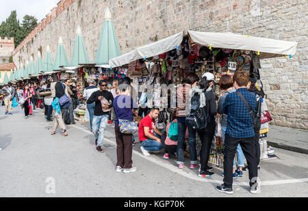 Souvenirs for sale at stalls close to the Leaning Tower of Pisa, Tuscany, Italy Stock Photo