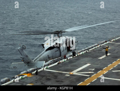 An MH-60S Seahawk helicopter from Helicopter Sea Combat Squadron (HSC ...