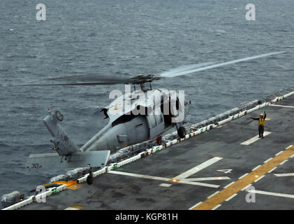 An Mh-60s Seahawk Helicopter From Helicopter Sea Combat Squadron (hsc 