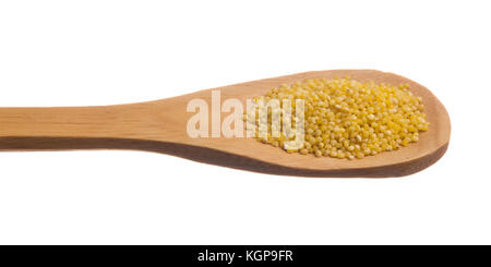 Panicum miliaceum is scientific name of Proso Millet cereal grain. Also known as Broomcorn Millet, Painco (portuguese) and Mijo (spanish). Grains over Stock Photo