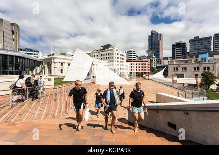 WELLINGTON, NEW ZEALAND - MARCH 1, 2017: People walk in the pedestrian area in fron of the city hall in downtown Wellington on a sunny day in New Zeal Stock Photo