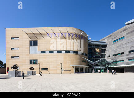 WELLINGTON, NEW ZEALAND - MARCH 1, 2017: People walk toward the entrance of of the Museum of New Zealand Te Papa Tongarewa in Wellingtion, New Zealand Stock Photo