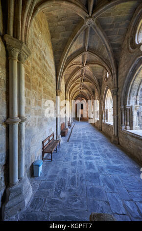 EVORA, PORTUGAL - JULY 01, 2016:  The interior of medieval cloister of Evora Cathedral (Se) with the massive arcade made of granite. Portugal Stock Photo