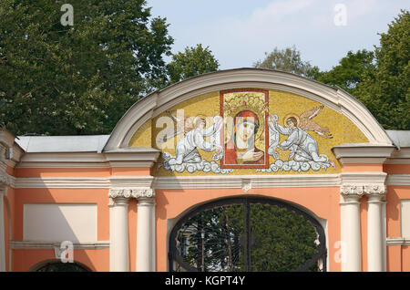 On the entrance wall to the Church yard to see the Holy face of the virgin. Stock Photo