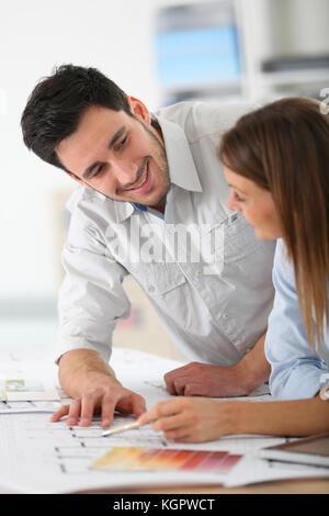 Team of architects working together on project Stock Photo