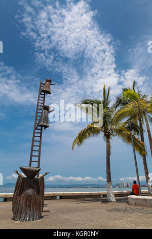 PUERTO VALLARTA, MEXICO - SEPTEMBER 6, 2015: Searching for Reason statue at Puerto Vallarta, Mexico. Sculpure was made by Sergio Bustamante in 2000. Stock Photo