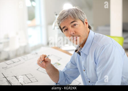 Portrait of smiling architect working in office Stock Photo