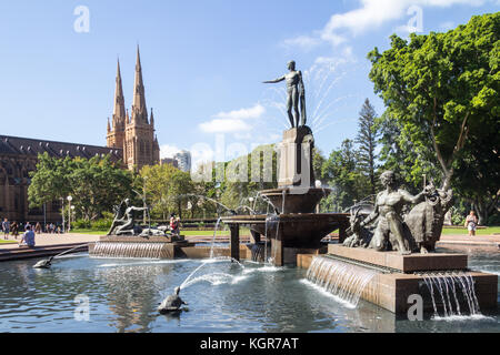 J. F. Archibald Memorial Fountain, Hyde Park with St Marys cathedral, Sydney, NSW, New South Wales, Australia Stock Photo