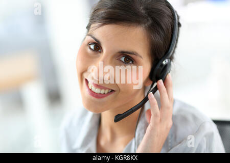 Portrait of beautiful customer service representative Stock Photo