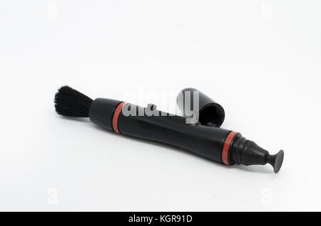 lens pen,Lens cleaning tools isolated on a white background Stock Photo