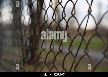 Metal wire Fence with the Lachine Canal in the Background Stock Photo