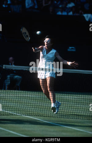 Billie Jean King reaching for a volley at Wimbledon, 1983 Stock Photo