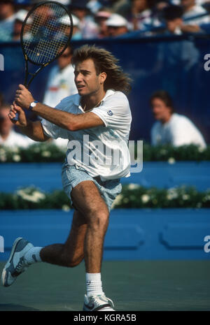 Andre Agassi follows through on a backhand during the 1988 US Open at Flushing Meadows. Stock Photo