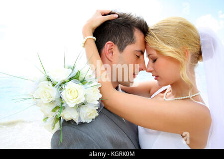Just married couple sharing romantic moment Stock Photo