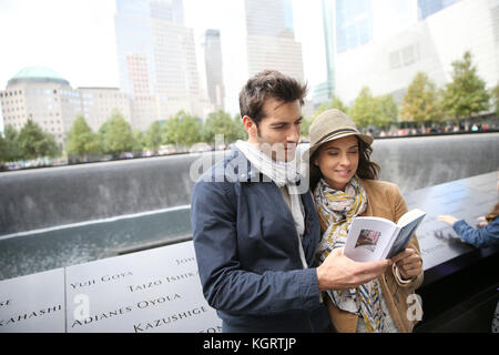 Tourists visiting 911 memorial in Manhattan Stock Photo