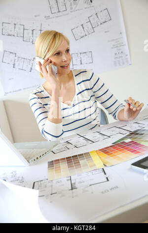 Woman architect on the phone Stock Photo