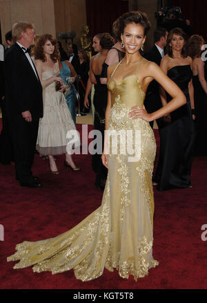 Jessica Alba arriving at the 78th Annual Academy Awards at the Kodak Theatre in Hollywood March 5th, 2006. Jessica Alba 564  = Fashion, full length, People, Jessica Alba, actress, Vertical, USA, Celebrities, Looking At Camera, Arts Culture and Entertainment, Event, Attending, One woman Only, One Person,, fashion dress,   or fashion pants Stock Photo
