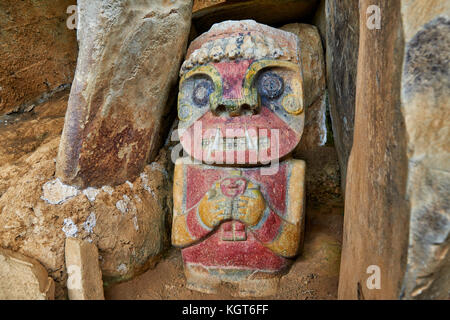 El Purutal, painted stone carved figure of an unknown pre-colombian culture near San Agustin, Colombia, South America Stock Photo