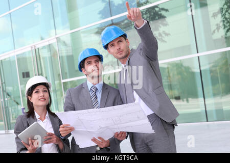Business people checking construction site Stock Photo