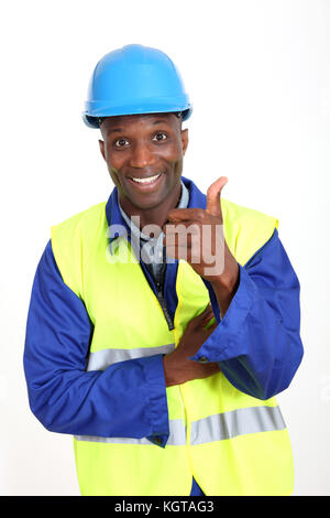 Construction worker showing thumb up Stock Photo